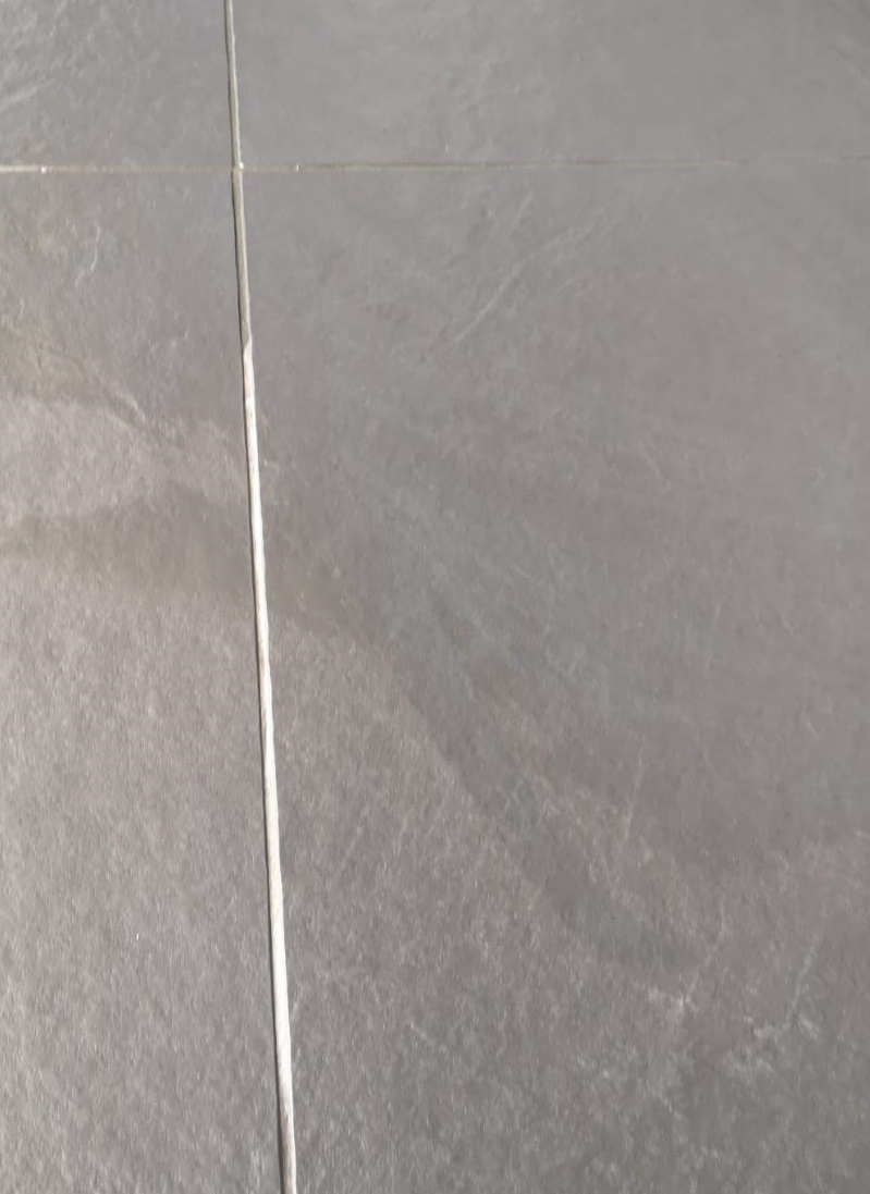 Hoe worden verkleurde tegelvoegen hersteld?